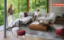 Il divano Adda di Flexform nella campagna "Home at Last"